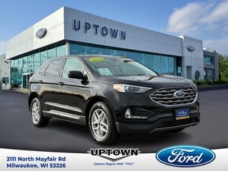 AI clipped image background showcasing premium pre-owned vehicles at Uptown Ford Lincoln in Milwaukee, WI.