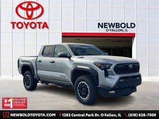 Toyota vehicle overlay featured on a professional dealership image for Newbold Toyota in O’Fallon, IL